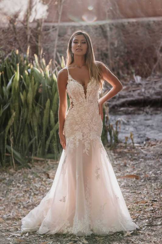 Full length view of ivory lace and chiffon wedding dress
