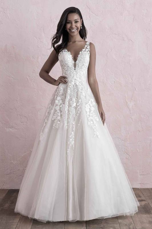 Full length view of ivory lace wedding dress with plunge neckline
